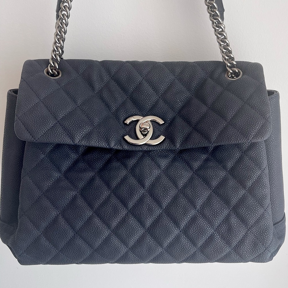 - Chanel Flap Caviar Bag